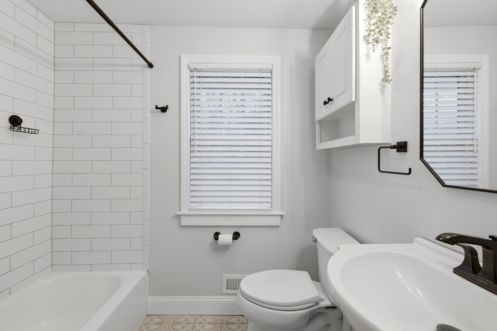 7 Paulette Drive Danvers, MA 01923 - Photo 12 of 25 a bathroom with a sink a toilet and bathtub