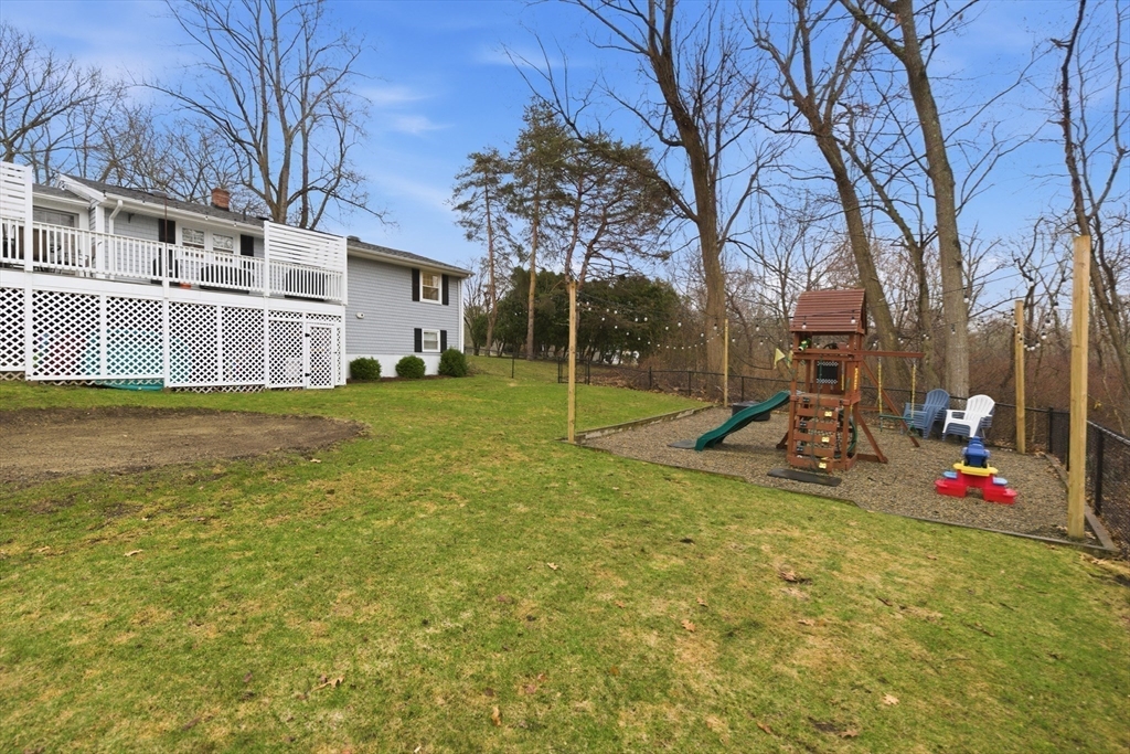 7 Paulette Drive Danvers, MA 01923 - Photo 23 of 25 a view of a house with backyard and tree
