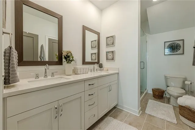 a bedroom with double bed and a window