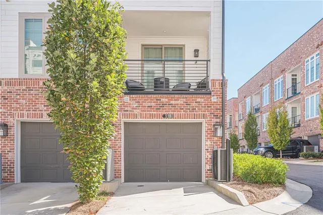 a front view of a building with street view