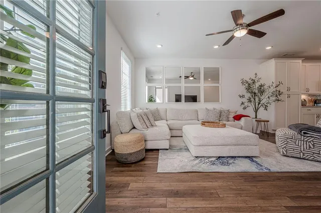 a kitchen with sink cabinets and wooden floor
