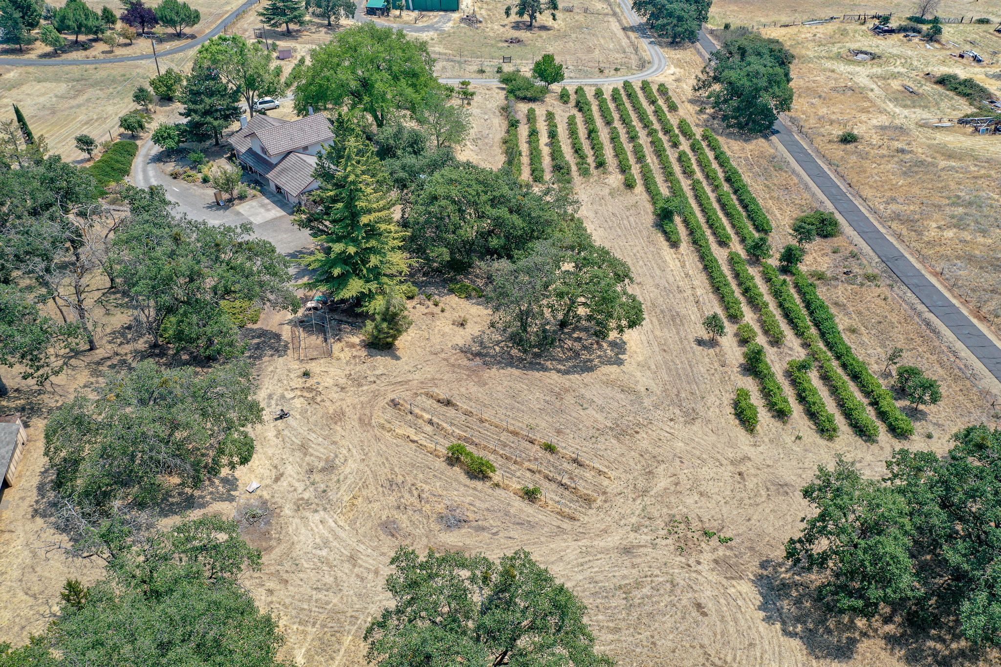 3632 Willow Springs Road Central Point, OR 97502 - Photo 32 of 36 an aerial view of swimming pool with residential house and outdoor space