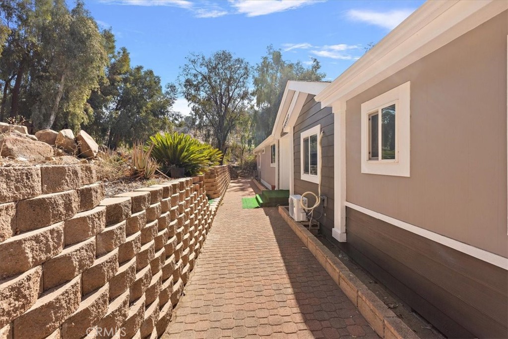 42557 Gibbel Road Hemet, CA 92544 - Photo 22 of 39 a view of a house with a large window