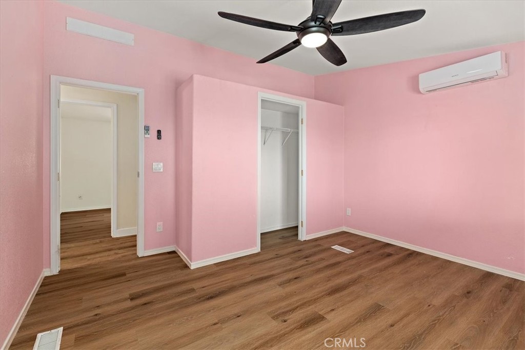 42557 Gibbel Road Hemet, CA 92544 - Photo 24 of 39 a view of empty room with wooden floor