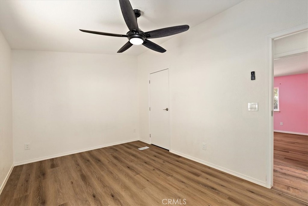 42557 Gibbel Road Hemet, CA 92544 - Photo 26 of 39 a view of a room with wooden floor