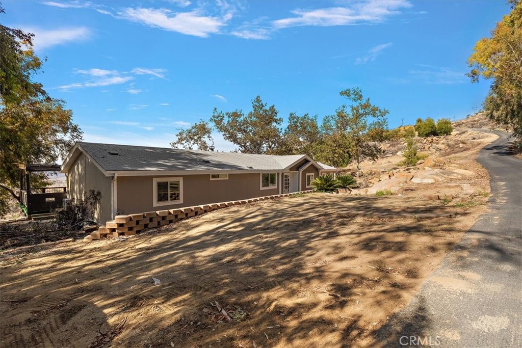 42557 Gibbel Road Hemet, CA 92544 - Photo 34 of 39 a view of a house with a yard