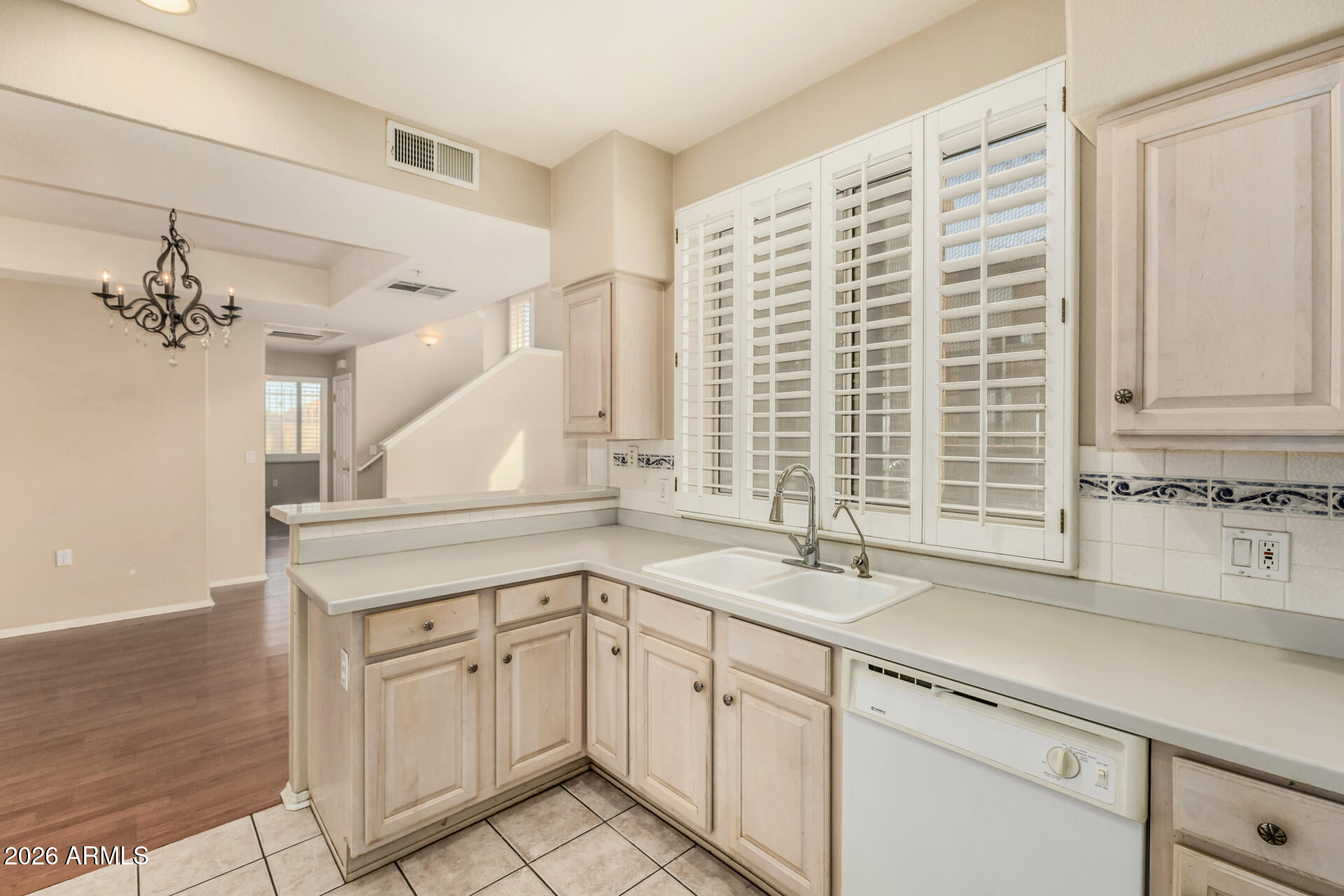 1445 East Broadway Road, Unit 116 Tempe, AZ 85282 - Photo 15 of 36 a kitchen with a sink and cabinets