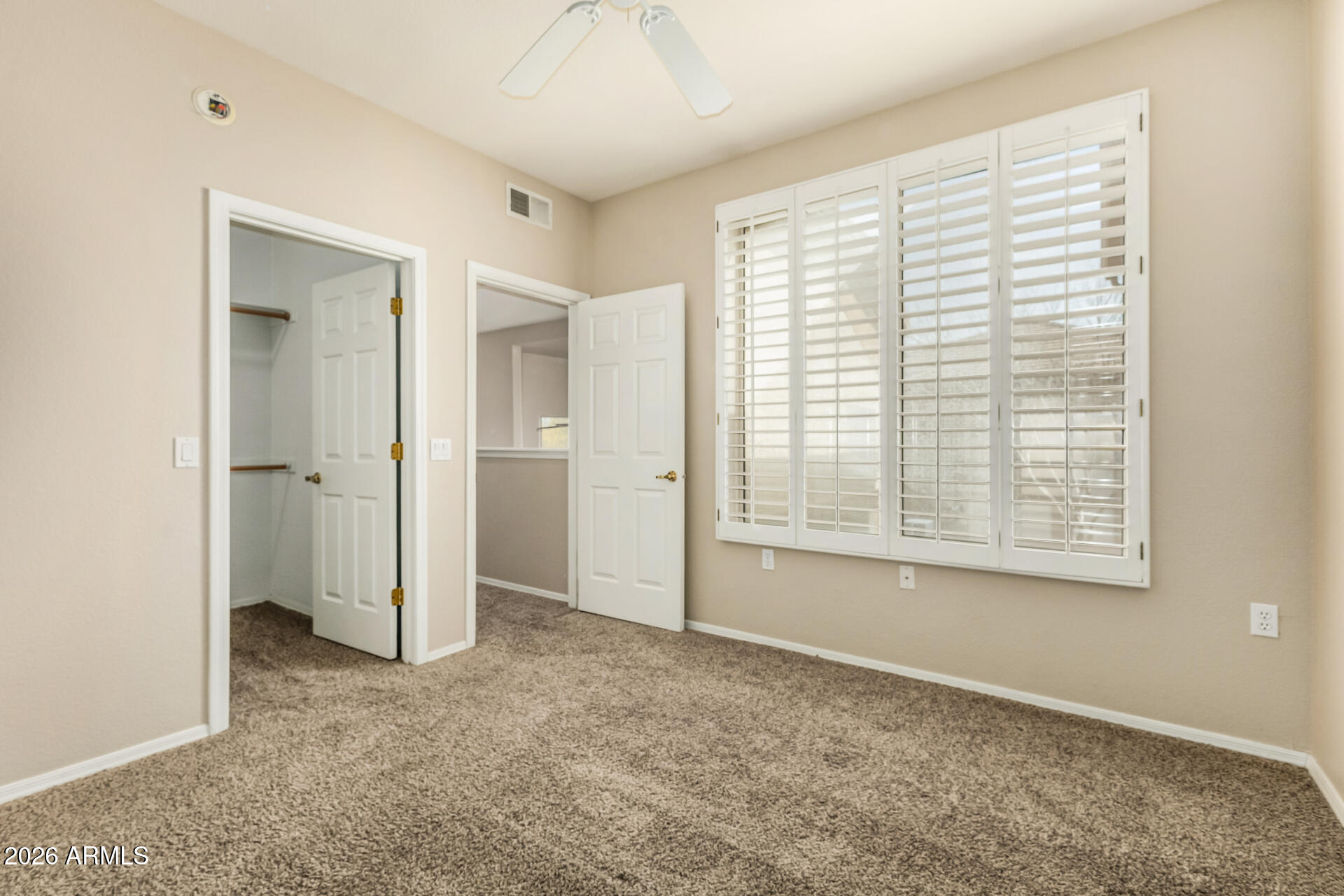 1445 East Broadway Road, Unit 116 Tempe, AZ 85282 - Photo 21 of 36 a view of an empty room with a window