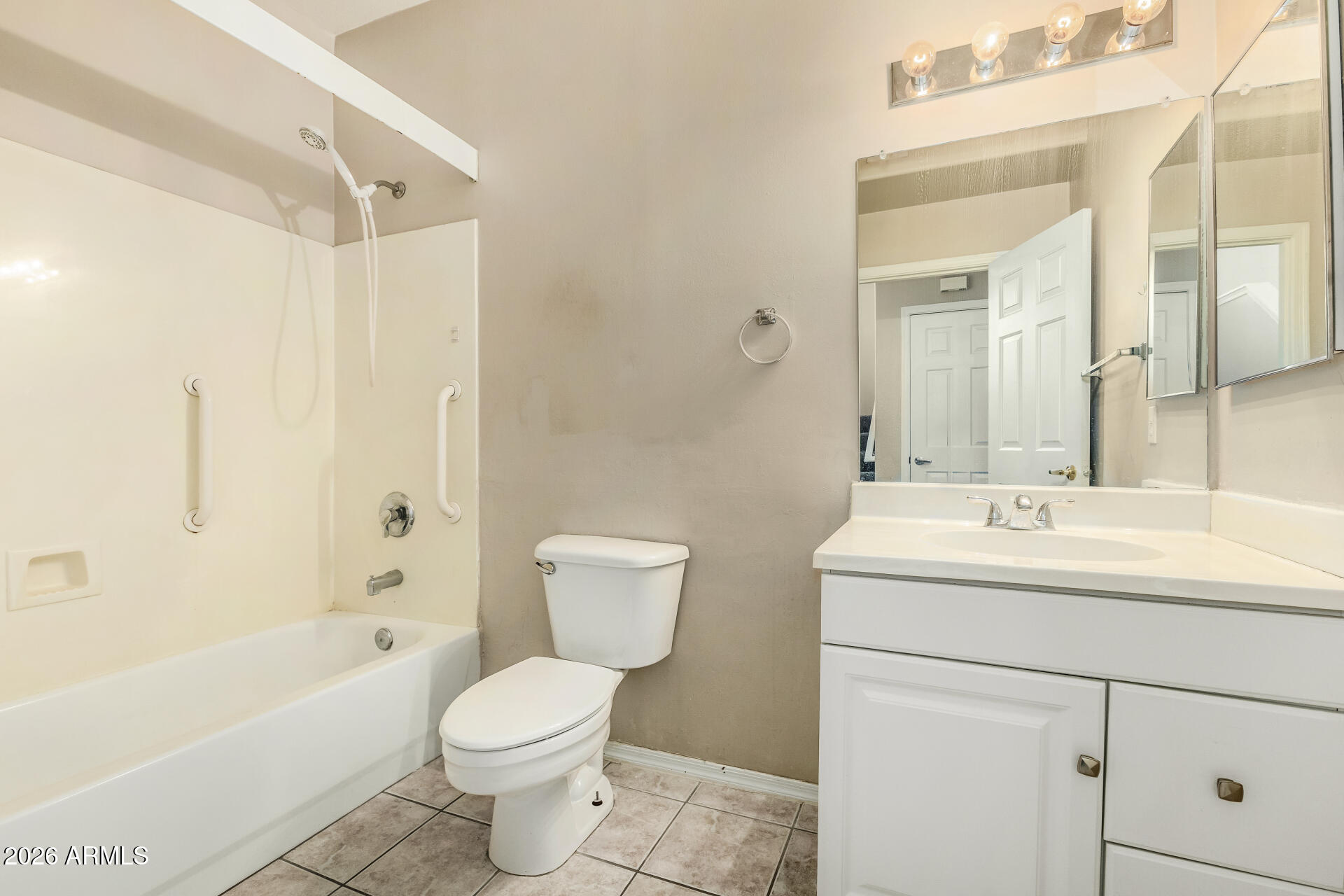 1445 East Broadway Road, Unit 116 Tempe, AZ 85282 - Photo 24 of 36 a bathroom with a sink toilet and shower