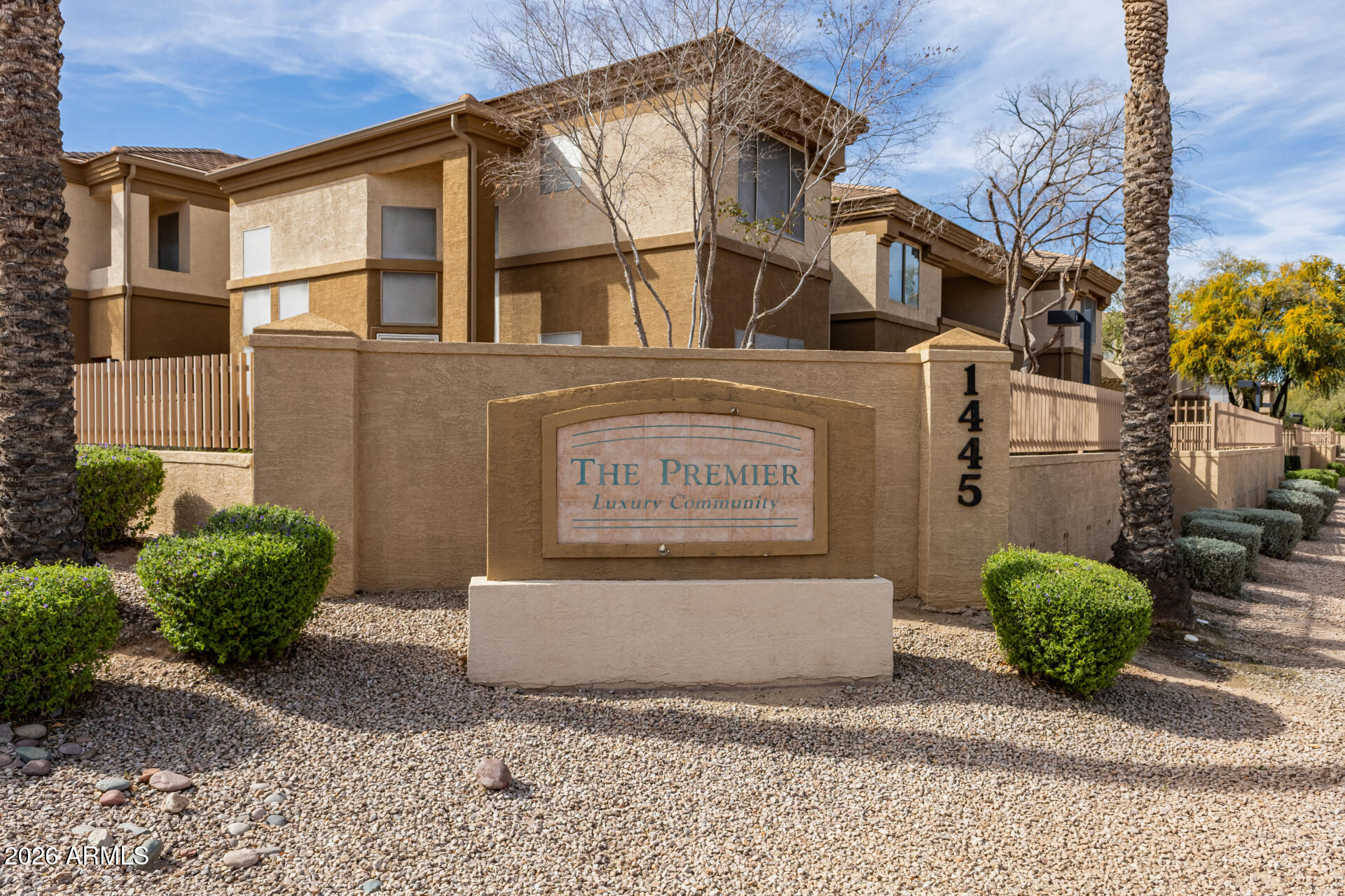 1445 East Broadway Road, Unit 116 Tempe, AZ 85282 - Photo 35 of 36 a view of a white house with large windows