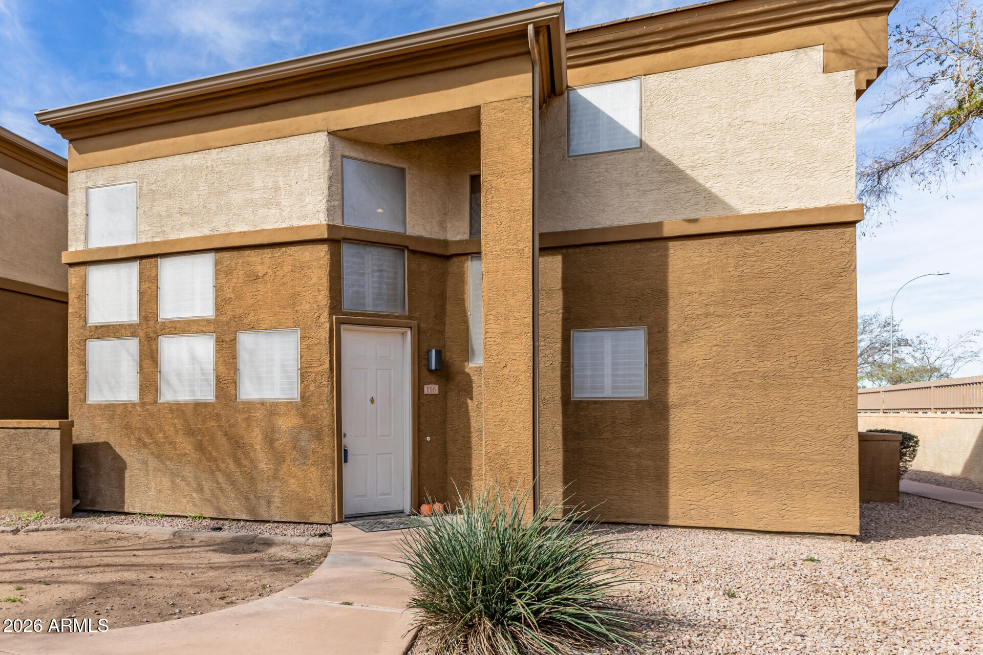 1445 East Broadway Road, Unit 116 Tempe, AZ 85282 - Photo 7 of 36 a view of entrance gate of a house