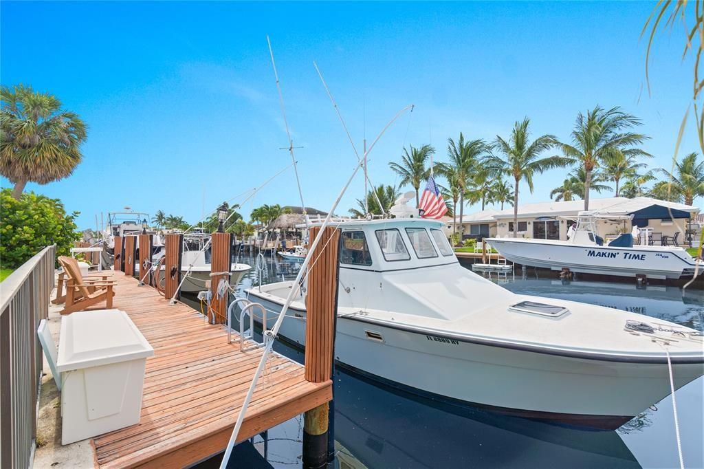 2670 Northeast 47th Street Lighthouse Point, FL 33064 - Photo 11 of 12 a view of a outdoor kitchen with sitting area