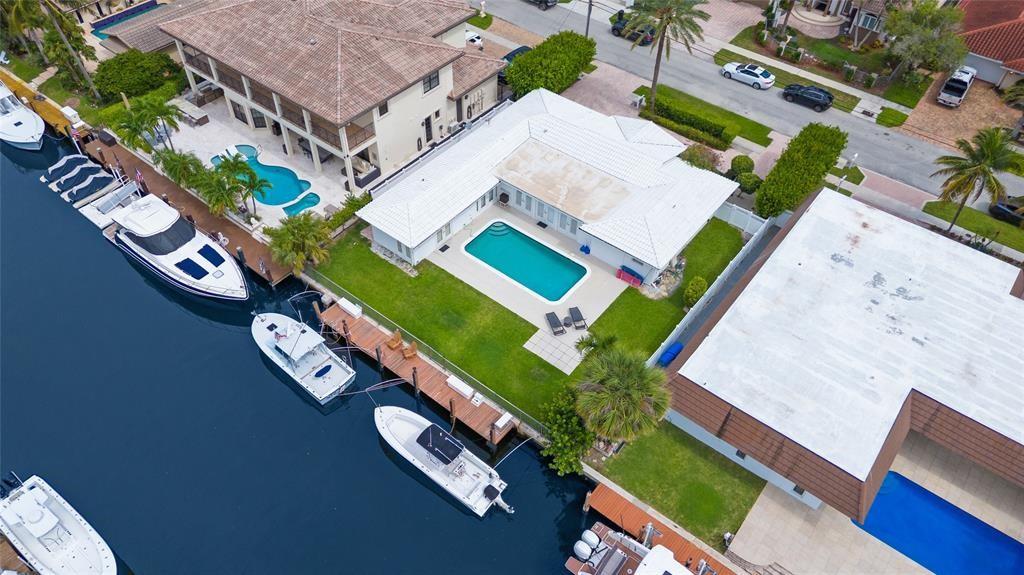 2670 Northeast 47th Street Lighthouse Point, FL 33064 - Photo 4 of 12 an aerial view of a house
