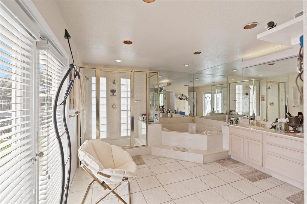 2670 Northeast 47th Street Lighthouse Point, FL 33064 - Photo 9 of 12 a large white kitchen with a large window and furniture