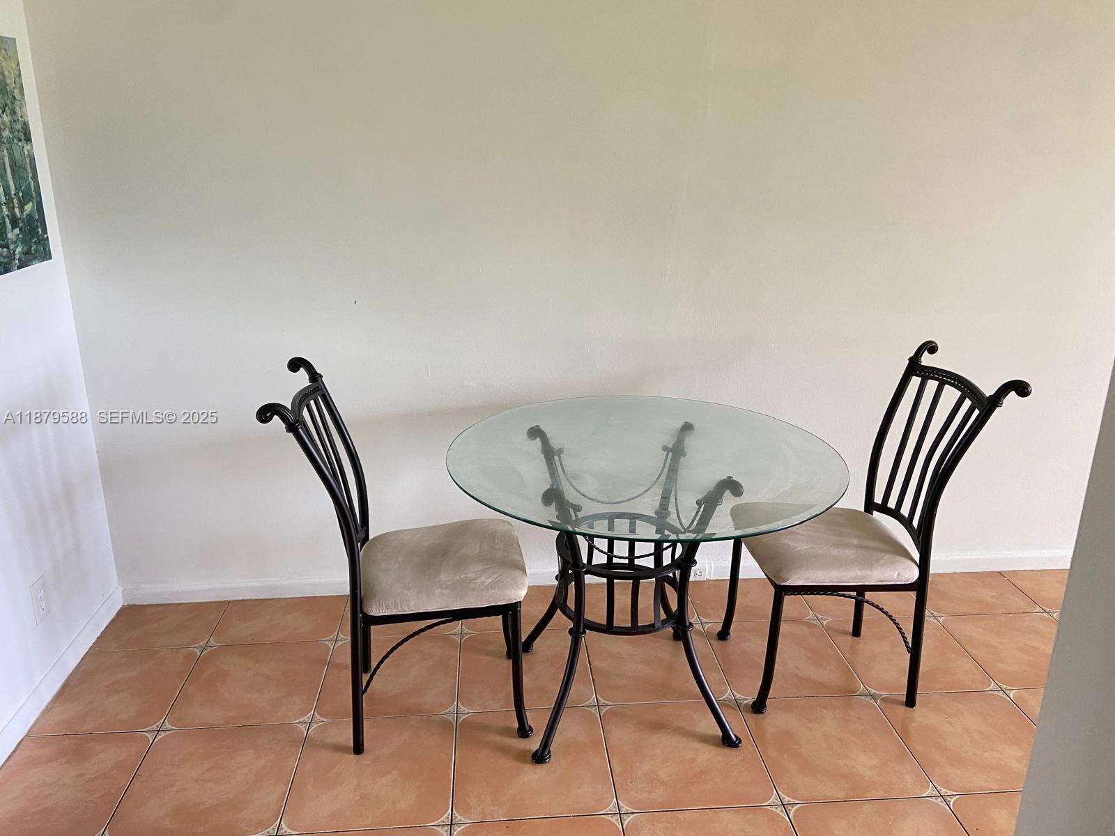 8 Fanshaw A, Unit 8 Boca Raton, FL 33434 - Photo 5 of 10 a view of a room with furniture and wooden floor