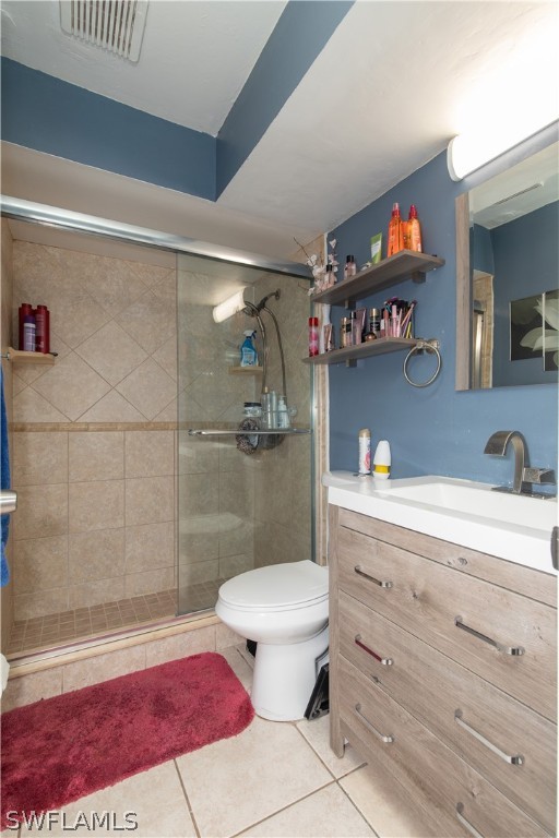 7467-69 Field Road, Unit 69 Fort Myers, FL 33967 - Photo 15 of 35 a bathroom with a sink a toilet and shower