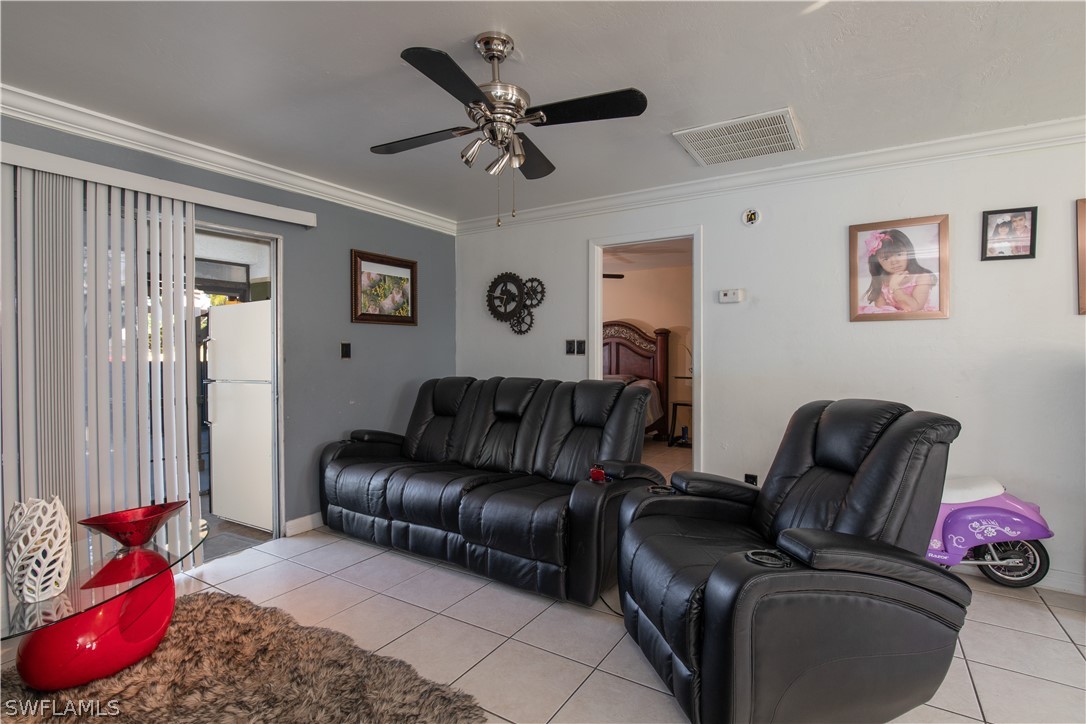 7467-69 Field Road, Unit 69 Fort Myers, FL 33967 - Photo 32 of 35 a living room with furniture