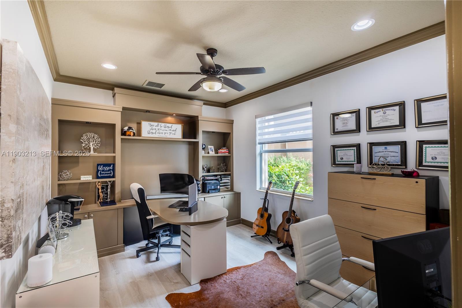 8292 Triana Point Avenue Boynton Beach, FL 33473 - Photo 14 of 60 a living room with furniture a window and a flat screen tv