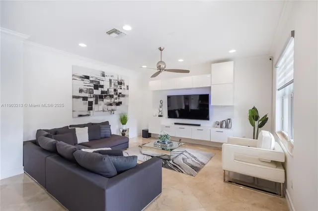 a kitchen with a table and chairs in it