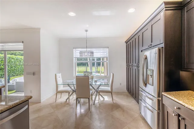 a view of yard with swimming pool and outdoor seating