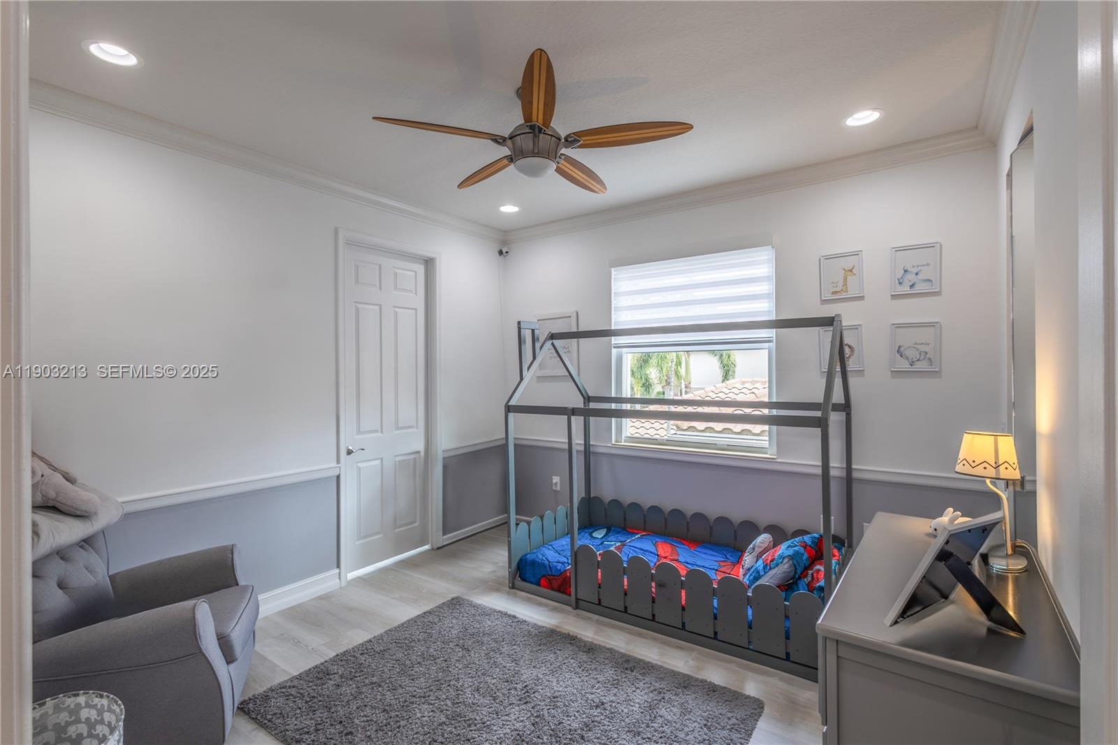 8292 Triana Point Avenue Boynton Beach, FL 33473 - Photo 37 of 60 a living room with furniture and a window