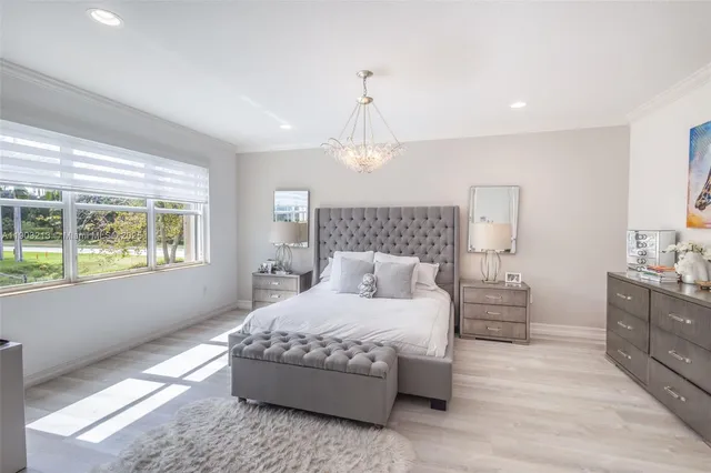 a bathroom with a granite countertop sink mirror and double