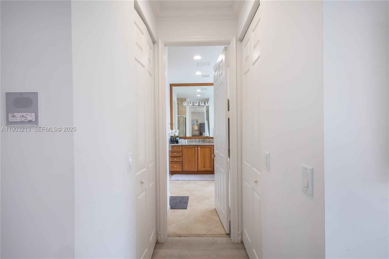 8292 Triana Point Avenue Boynton Beach, FL 33473 - Photo 47 of 60 a bathroom with a sink and a mirror
