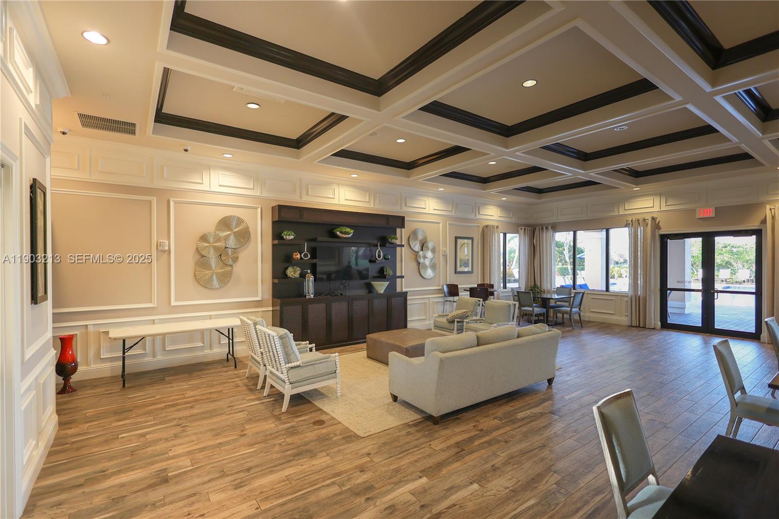 8292 Triana Point Avenue Boynton Beach, FL 33473 - Photo 53 of 60 a living room with furniture and a large window