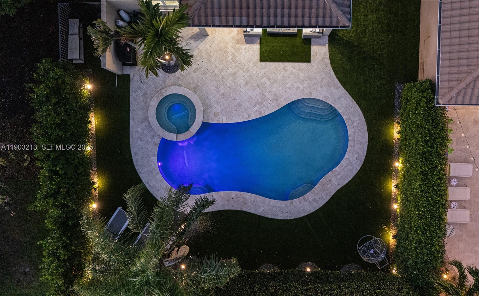 8292 Triana Point Avenue Boynton Beach, FL 33473 - Photo 6 of 60 an aerial view of a house with pool garden and outdoor seating