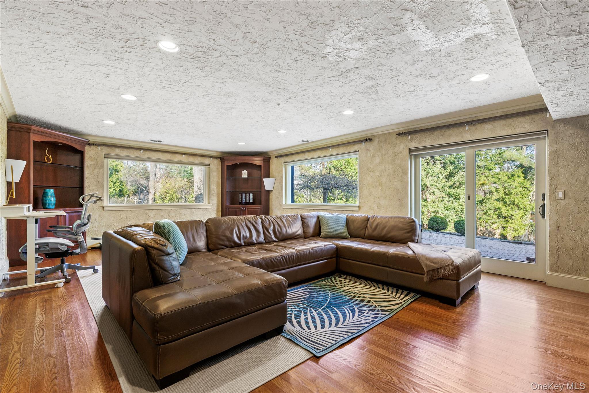 112 Woodlands Road Harrison, NY 10528 - Photo 18 of 43 a living room with furniture and a large window