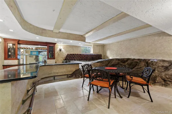 a room with furniture and a rug
