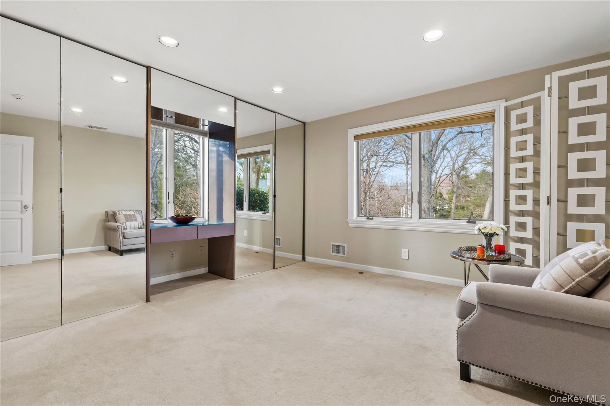 112 Woodlands Road Harrison, NY 10528 - Photo 27 of 43 a living room with furniture and a large window