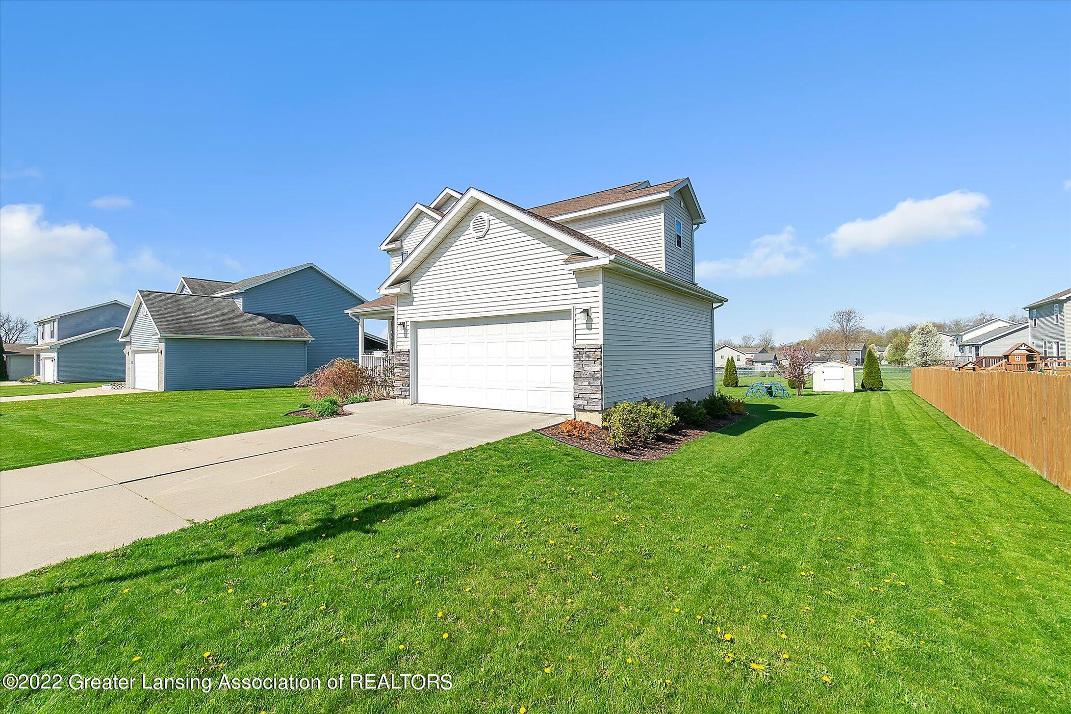 6373 Macadam Way Dimondale, MI 48821 - Photo 4 of 35 FreedomRE