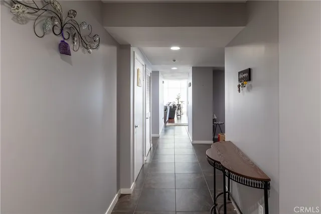 a living room with furniture windows and a fireplace