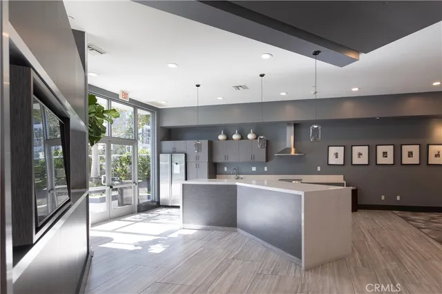 a living room with furniture a window and a table