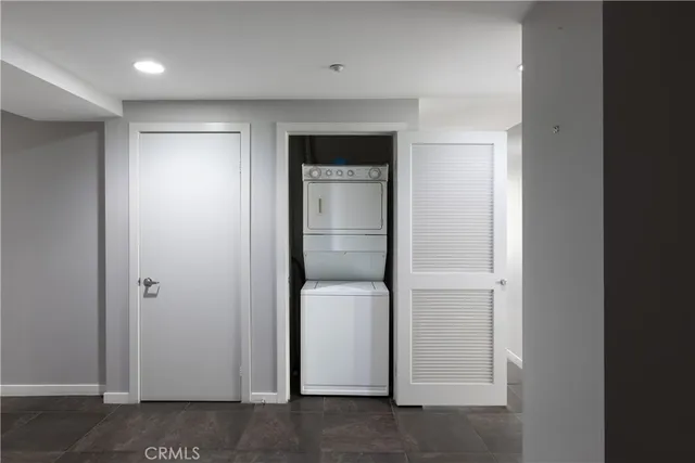 a view of an empty room and wooden floor