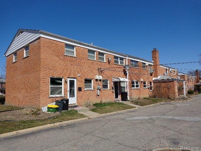 2821 West Thirteen Mile Road, Unit 2 Royal Oak, MI 48073 - Photo 5 of 23 261-843021 Back Left.JPG