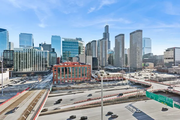 a view of a city with tall buildings