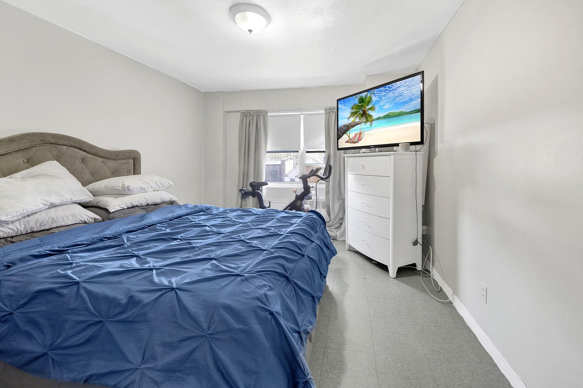 3130 Irwin Avenue, Unit 2C Bronx, NY 10463 - Photo 14 of 30 Bedroom featuring baseboards and tile patterned floors