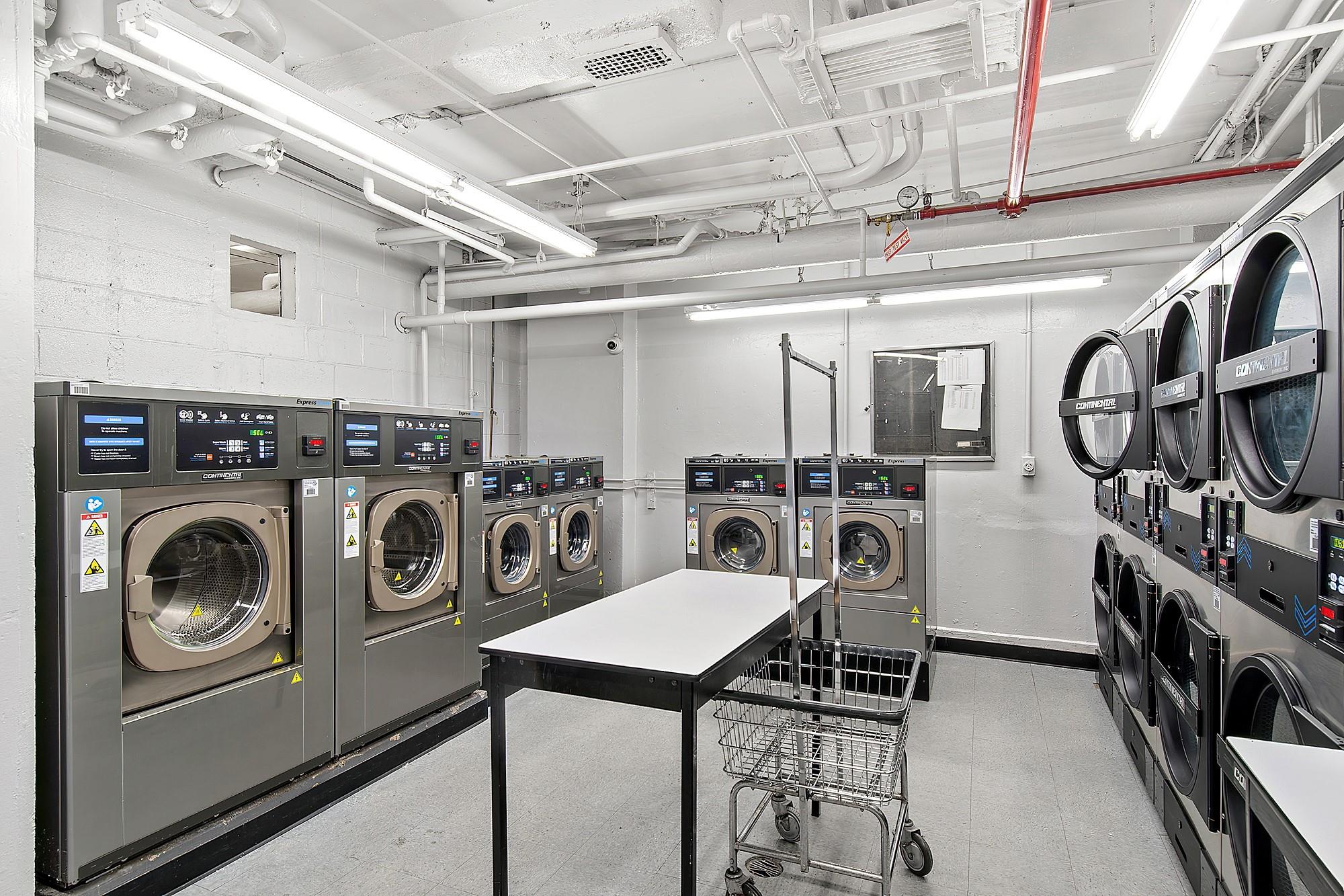 3130 Irwin Avenue, Unit 2C Bronx, NY 10463 - Photo 21 of 30 Common laundry area with separate washer and dryer, stacked washing maching and dryer, and visible vents