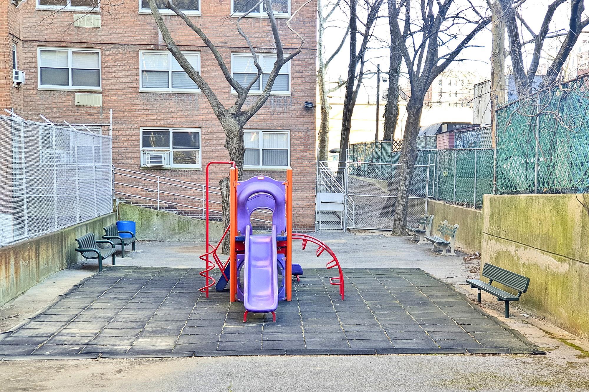 3130 Irwin Avenue, Unit 2C Bronx, NY 10463 - Photo 25 of 30 Community play area featuring fence and cooling unit