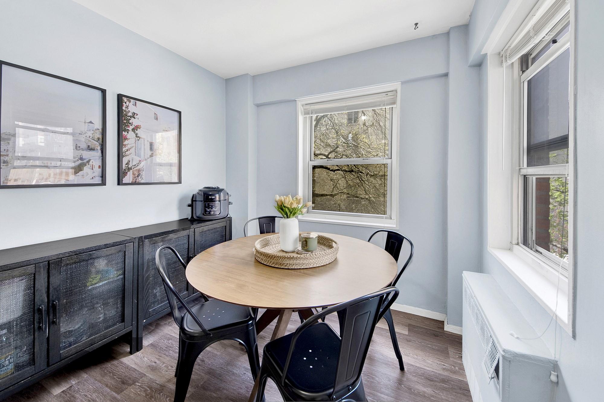 3130 Irwin Avenue, Unit 2C Bronx, NY 10463 - Photo 6 of 30 Dining room with baseboards and wood-style LVP flooring