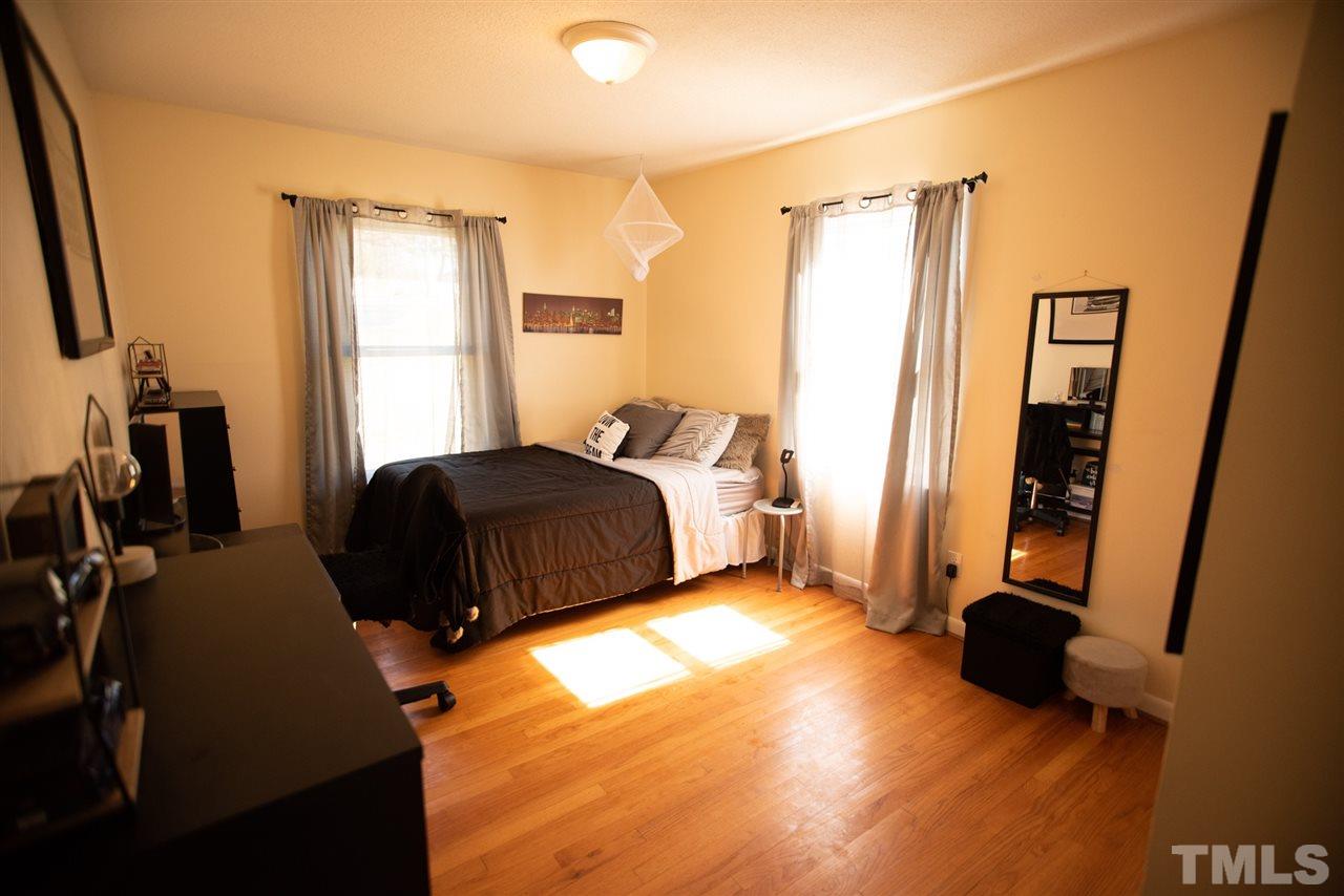 3029 Peebles Road Raleigh, NC 27616 - Photo 15 of 28 a bedroom with a bed and a window