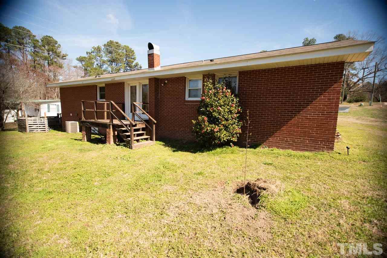 3029 Peebles Road Raleigh, NC 27616 - Photo 20 of 28 a view of house with yard and seating area