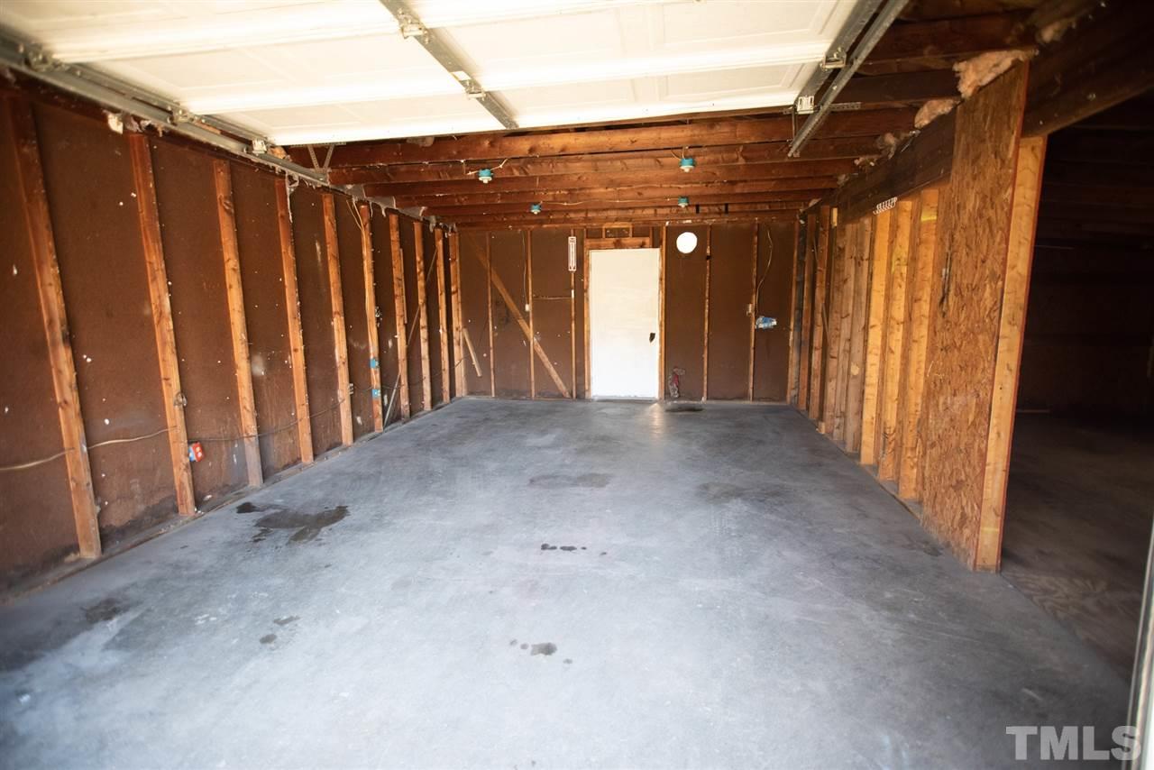 3029 Peebles Road Raleigh, NC 27616 - Photo 24 of 28 a view of a room with wooden walls