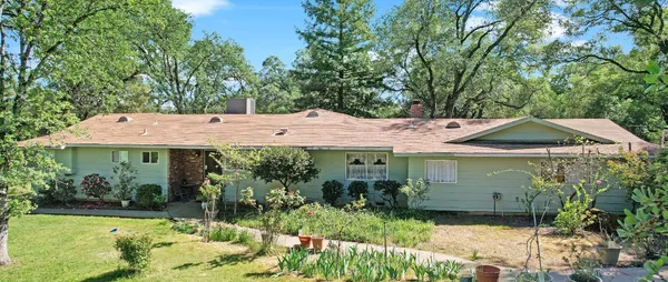 a view of a house with garden