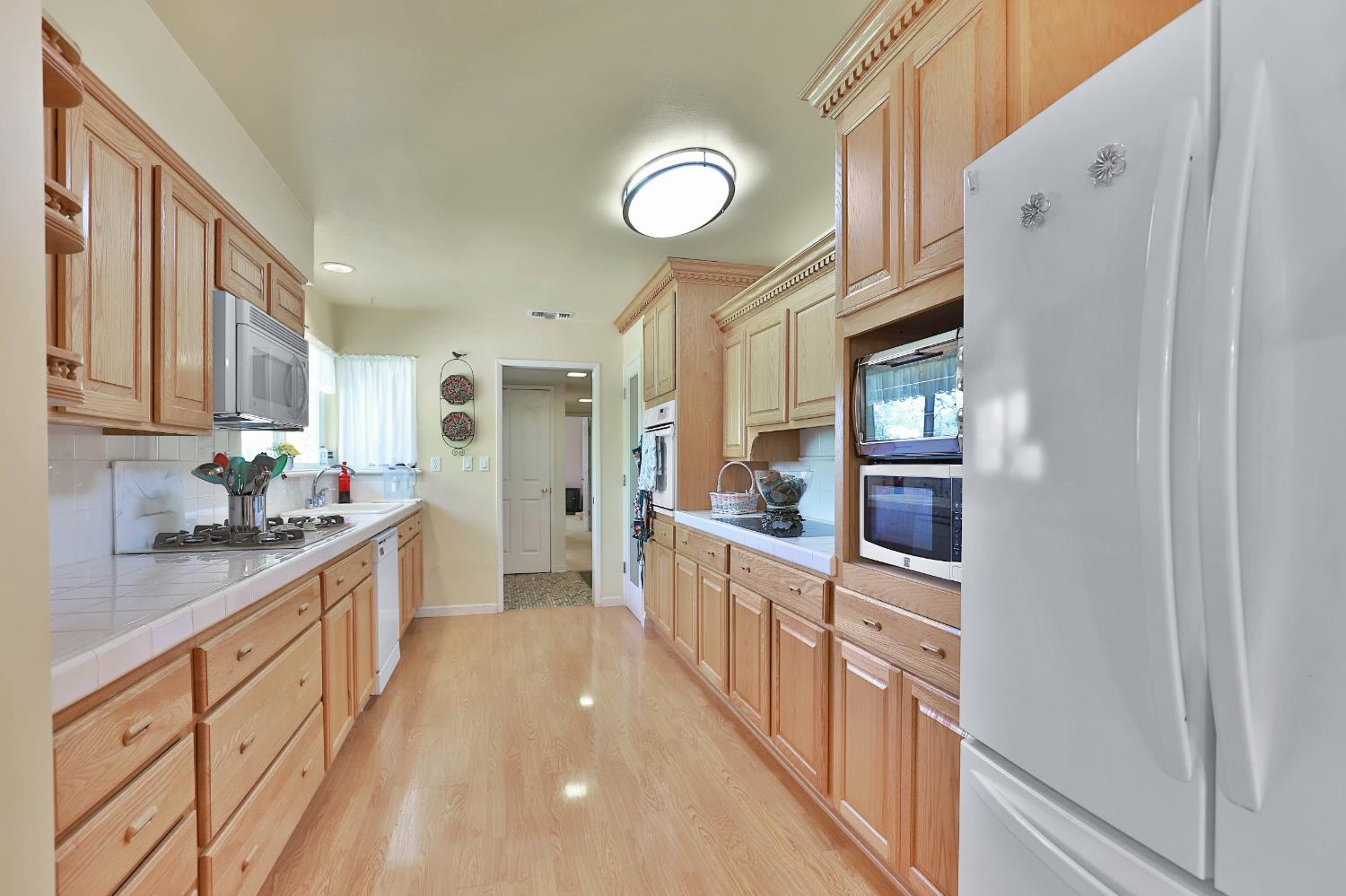 3840 Greenstone Road Placerville, CA 95667 - Photo 12 of 49 a kitchen with stainless steel appliances granite countertop a stove and a sink