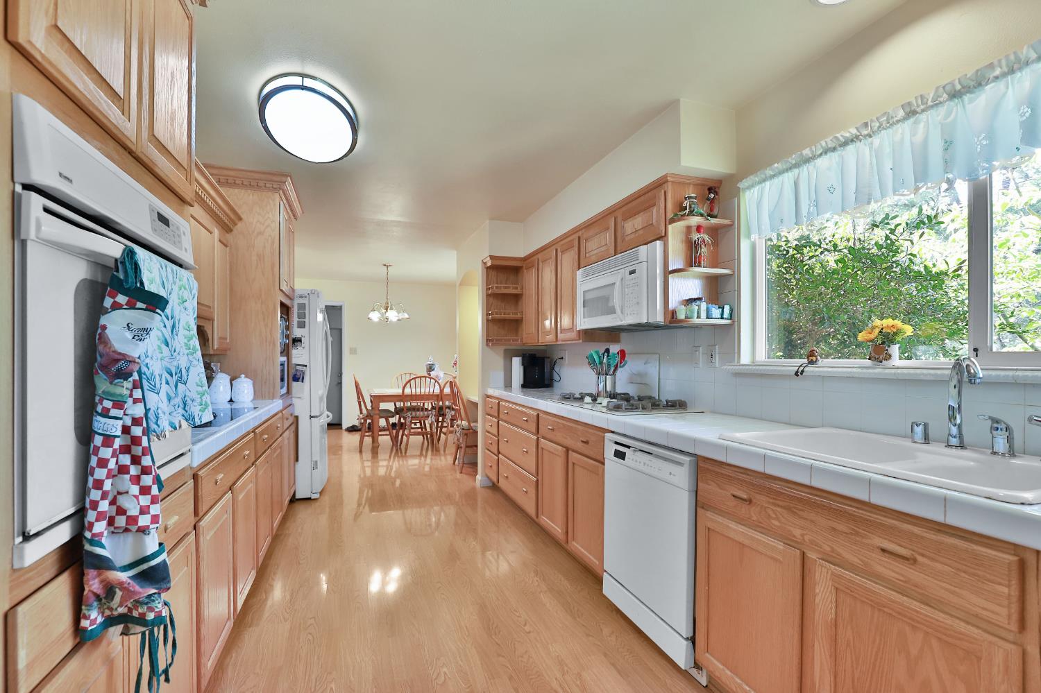 3840 Greenstone Road Placerville, CA 95667 - Photo 13 of 49 a kitchen with stainless steel appliances granite countertop a stove and a sink