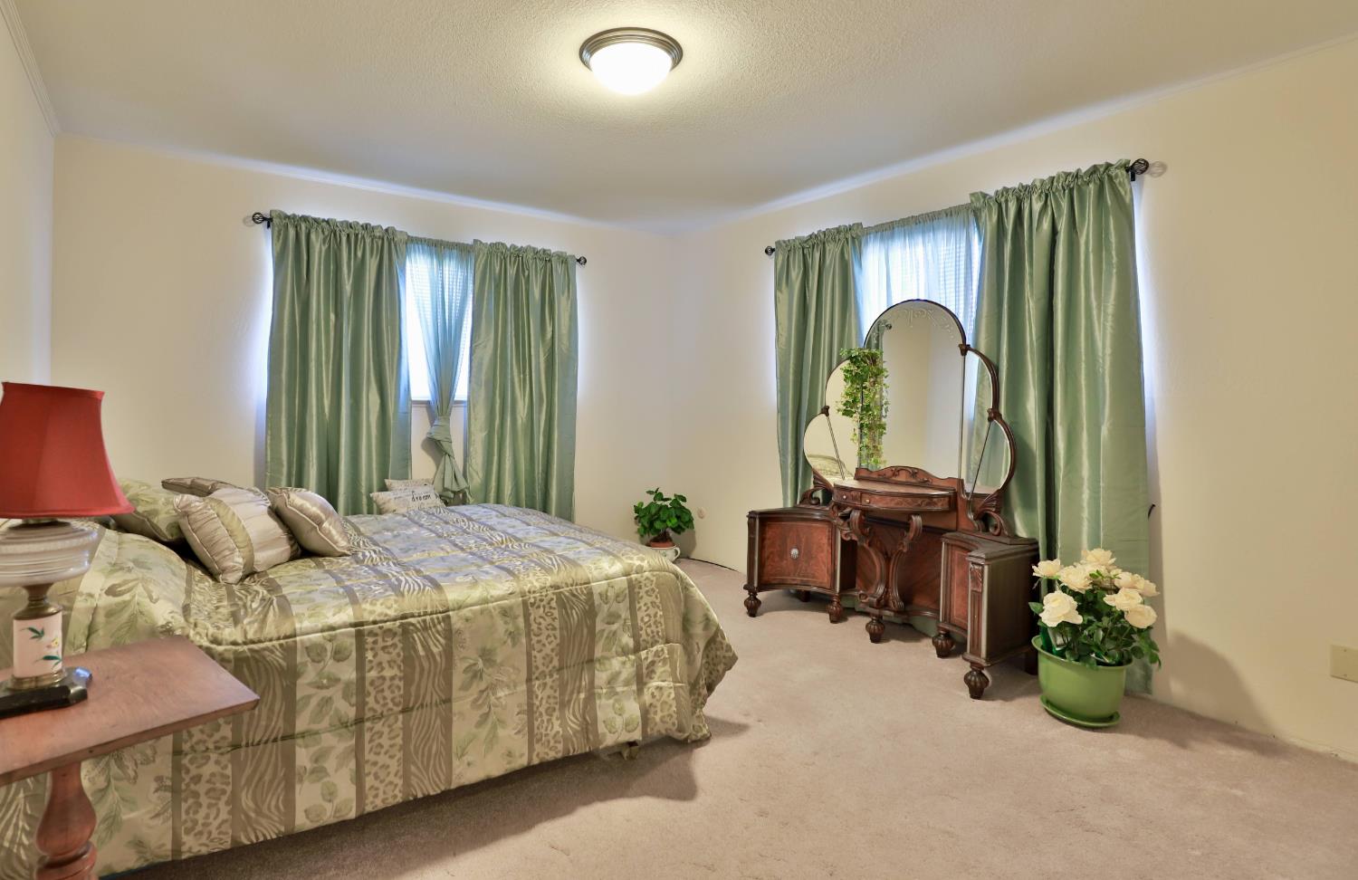3840 Greenstone Road Placerville, CA 95667 - Photo 21 of 49 a bedroom with a bed a dresser and a large mirror