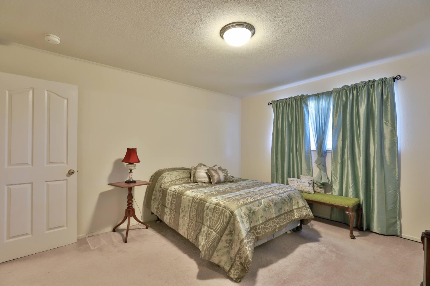 3840 Greenstone Road Placerville, CA 95667 - Photo 22 of 49 a bedroom with a bed and a window